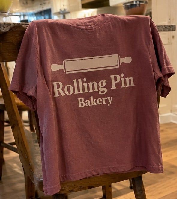 Customer photo of a custom bakery t-shirt